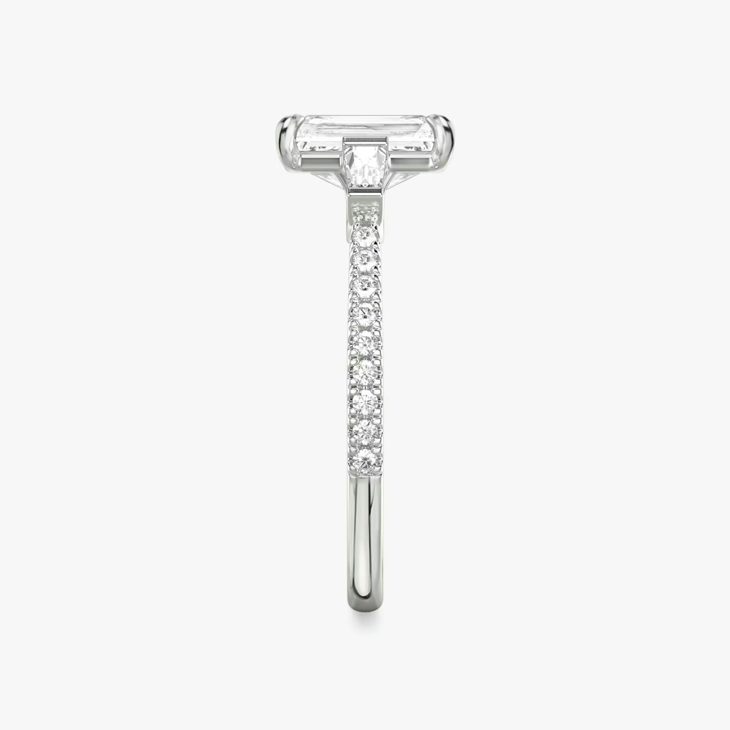The Three Stone | Radiant | Platinum | Band: Pavé | Side stone carat: 1/10 | Side stone shape: Tapered Baguette | Diamond orientation: vertical | Carat weight: See full inventory